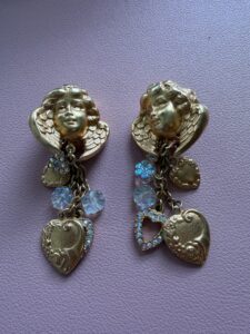Vintage Kirks Folly Gold Tone Cherub and Heart Charm Clip Earrings